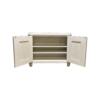 Cream-painted cabinet with double doors open to reveal three interior shelves, on short feet.