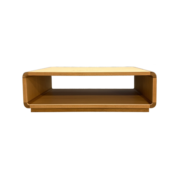 Low-profile wooden coffee table with rounded edges and an open storage shelf underneath